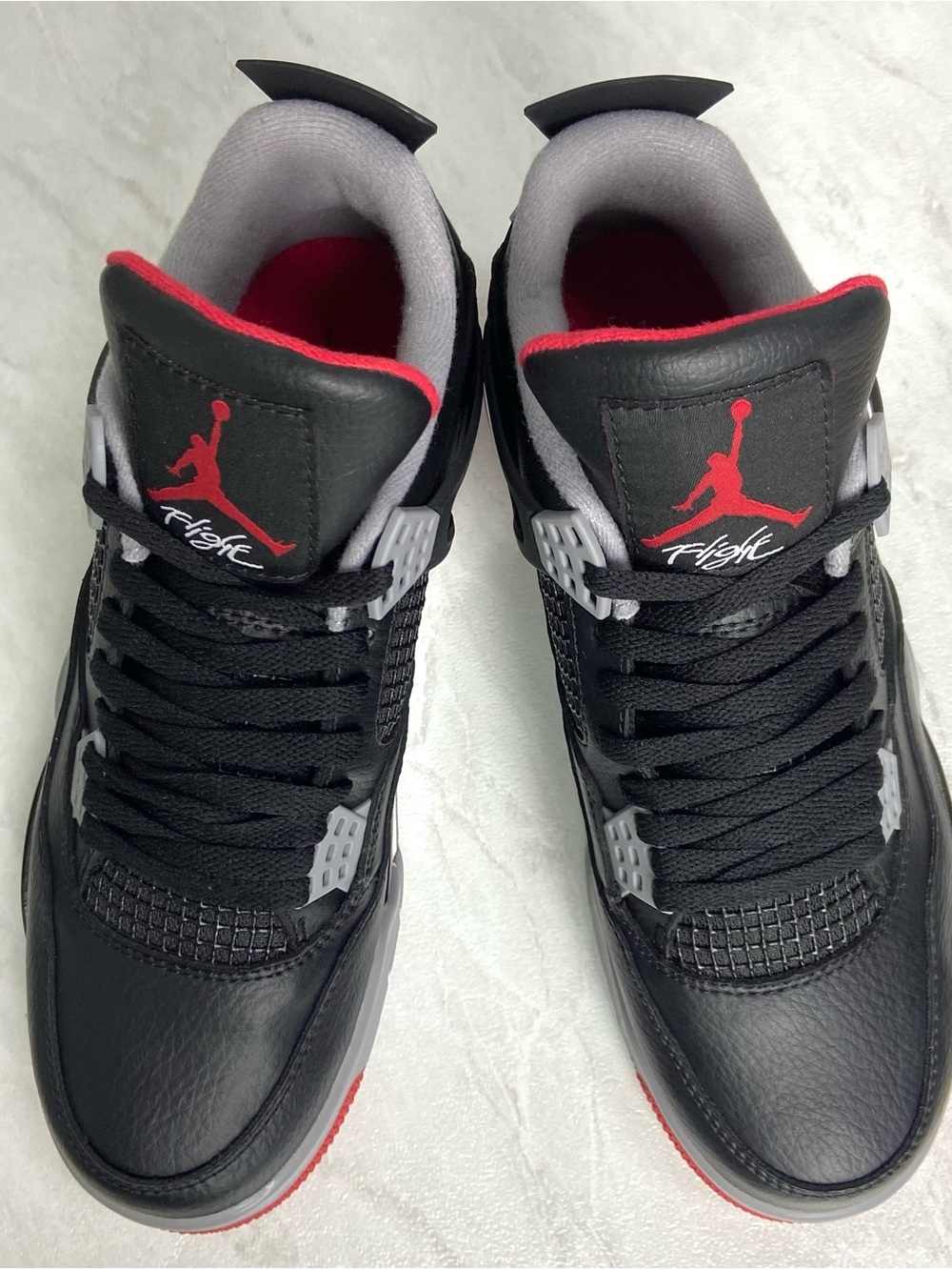 Jordan Black Sneakers with Red and Gray Accents